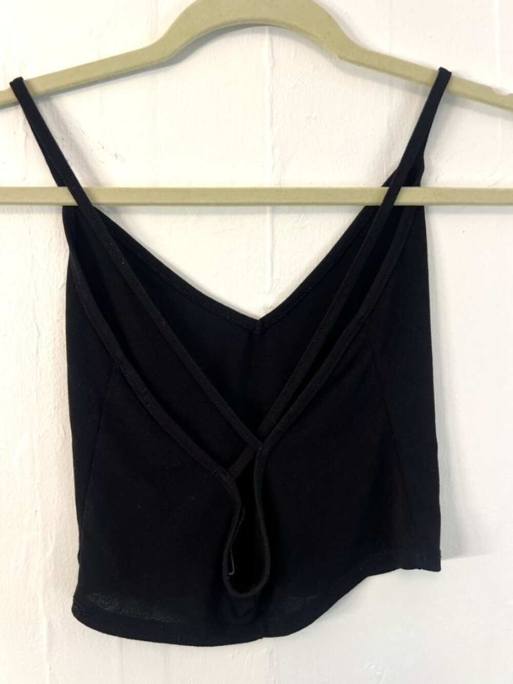 Cropped black spaghetti strap with cross back top